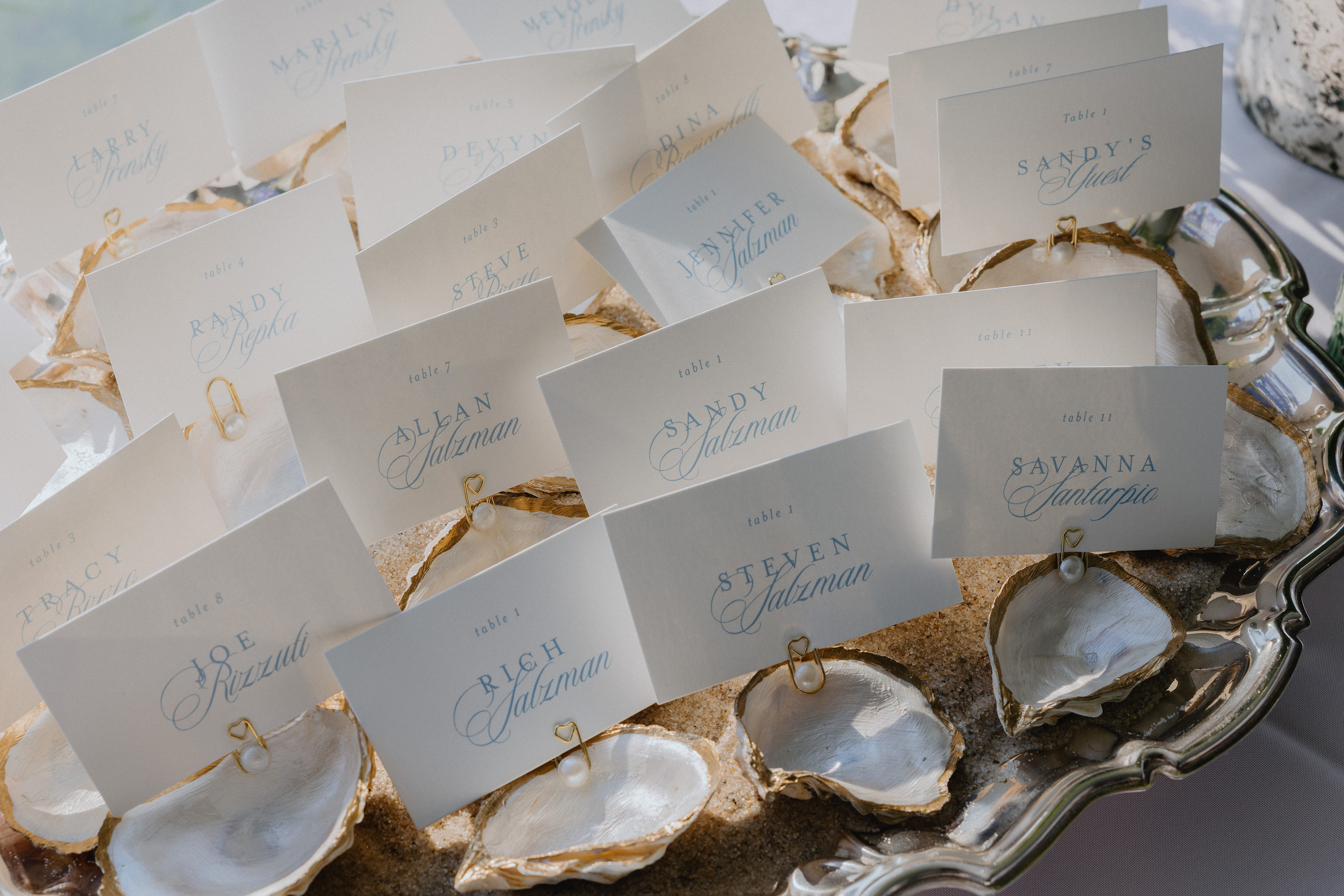 Elegant wedding place cards and table details in a coastal Massachusetts setting